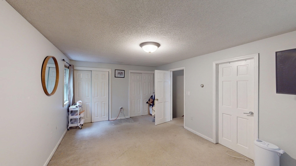 330 Arbor Street Lunenburg, MA 01462 - Photo 25 of 33 a view of a room with gym equipment and a window