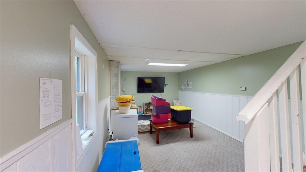 330 Arbor Street Lunenburg, MA 01462 - Photo 27 of 33 a living room with furniture and wooden floor