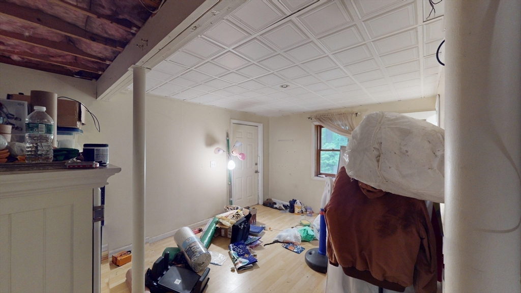 330 Arbor Street Lunenburg, MA 01462 - Photo 31 of 33 a room with furniture and a mirror