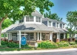 a view of a swimming pool with a lounge chairs