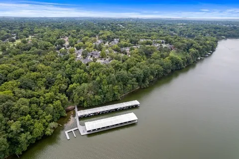 a bathroom with a shower and a shower curtain