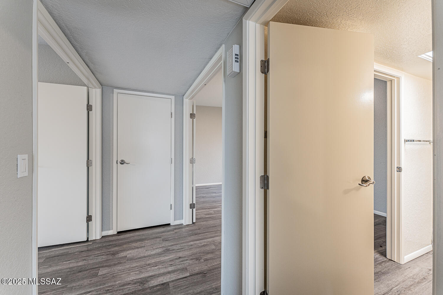 931 West Rio Guaymas Green Valley, AZ 85614 - Photo 21 of 39 a view of a hallway with wooden floor