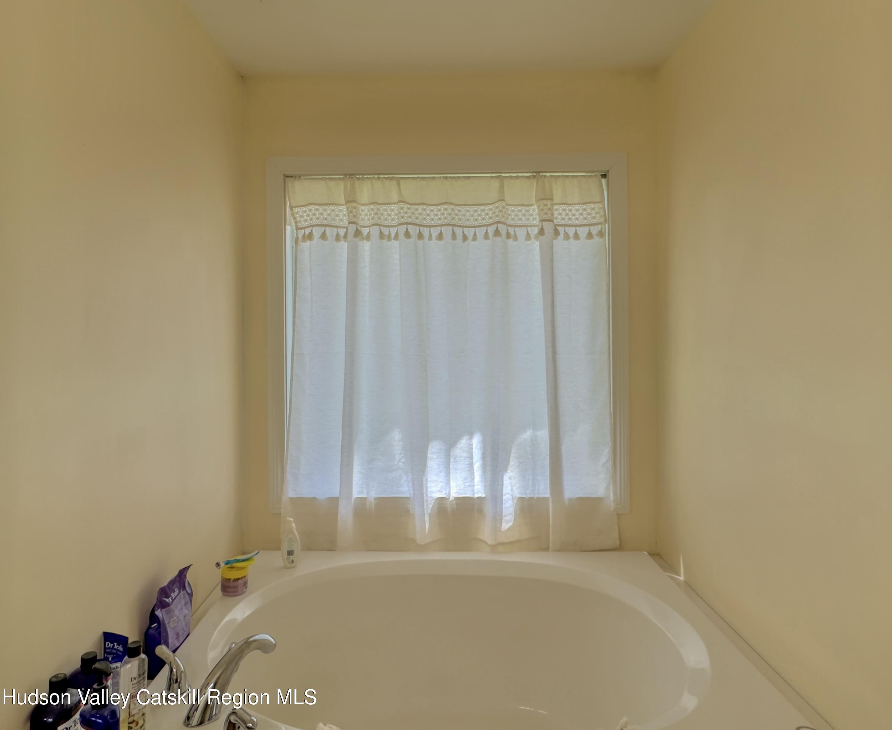 996 Sleepy Hollow Road Athens, NY 12015 - Photo 13 of 32 a bathroom with a bathtub and a shower