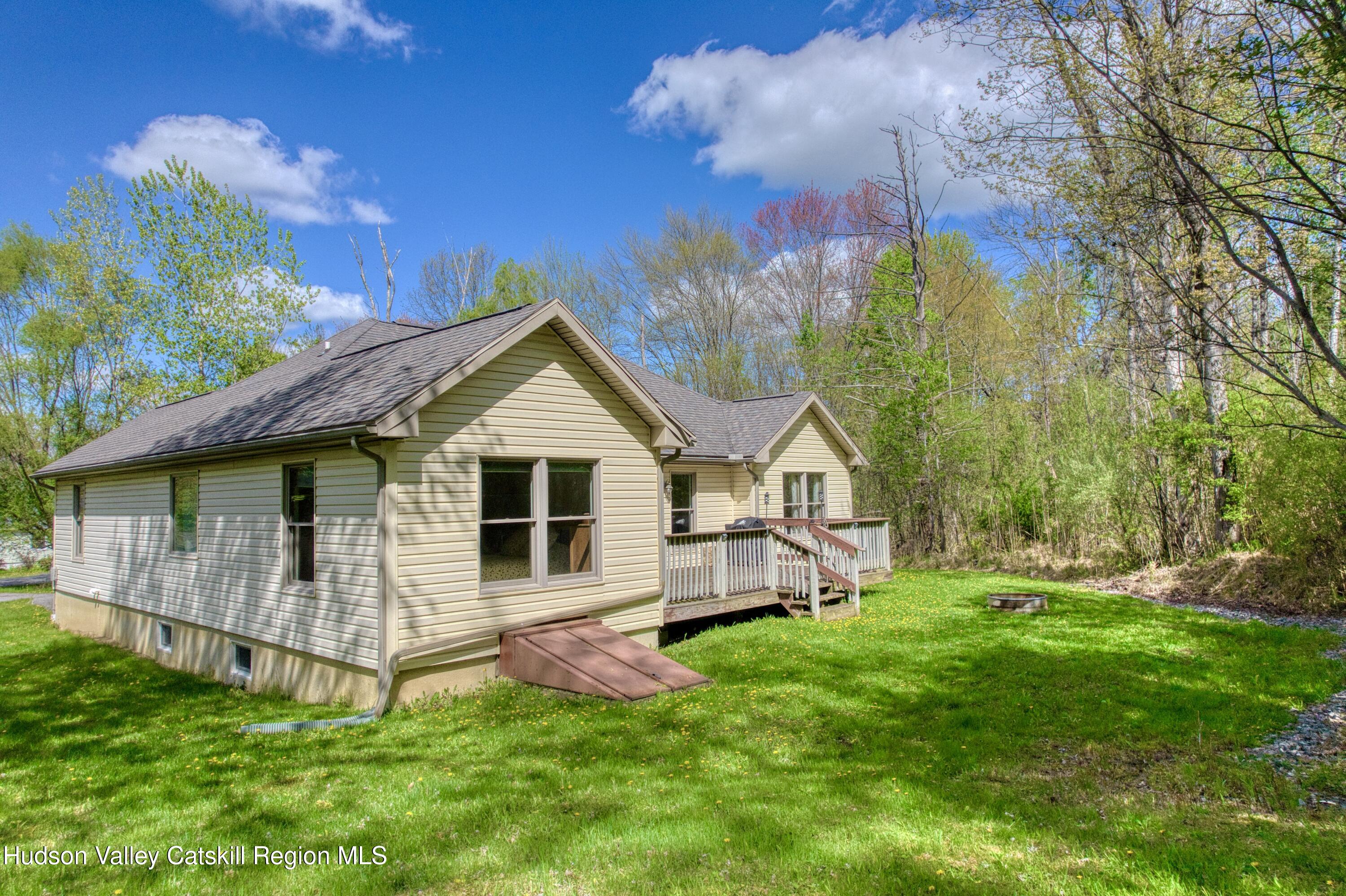 996 Sleepy Hollow Road Athens, NY 12015 - Photo 2 of 32 a view of a house with a yard and sitting area