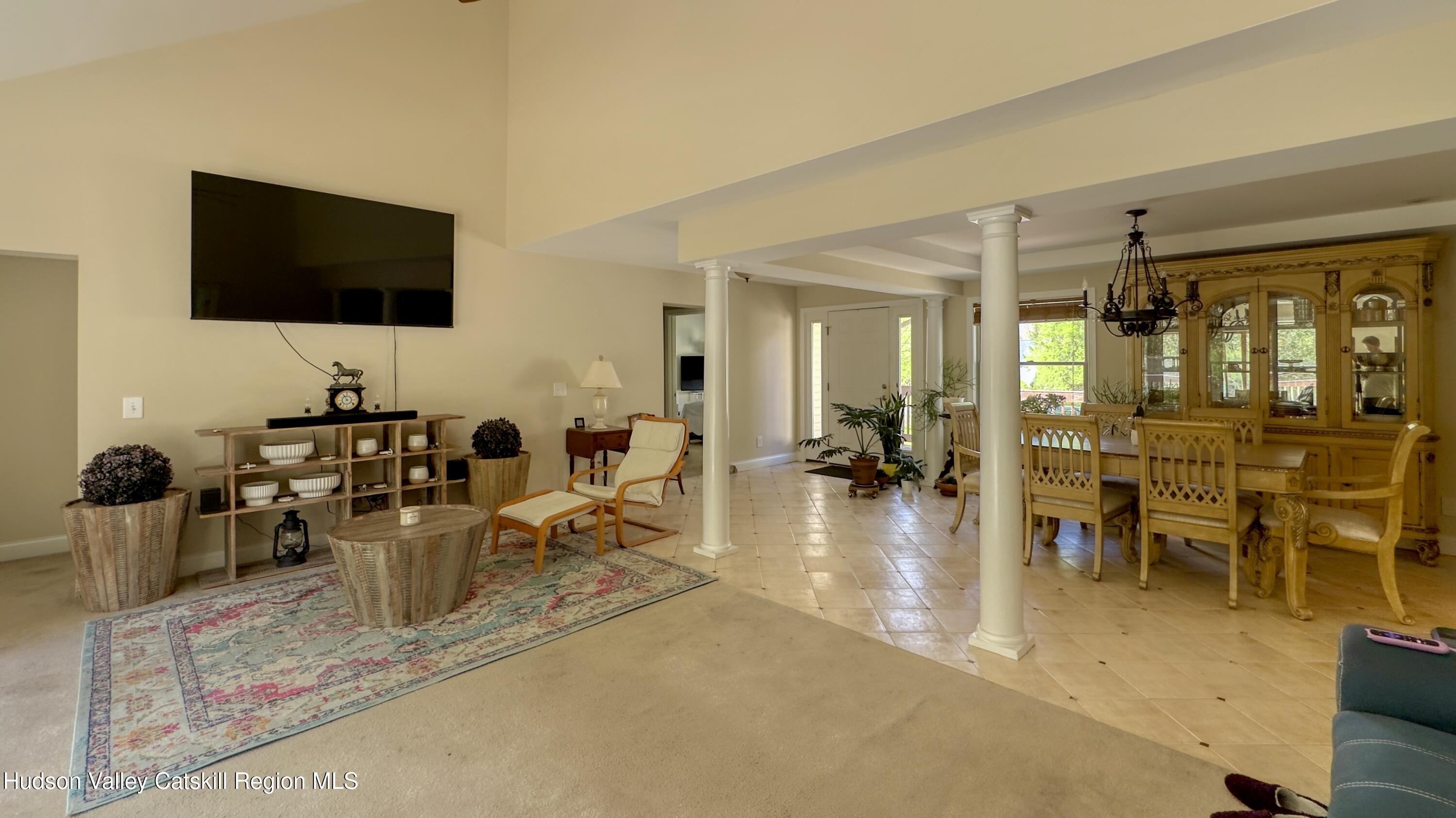 996 Sleepy Hollow Road Athens, NY 12015 - Photo 7 of 32 a living room with lots of furniture and a flat screen tv
