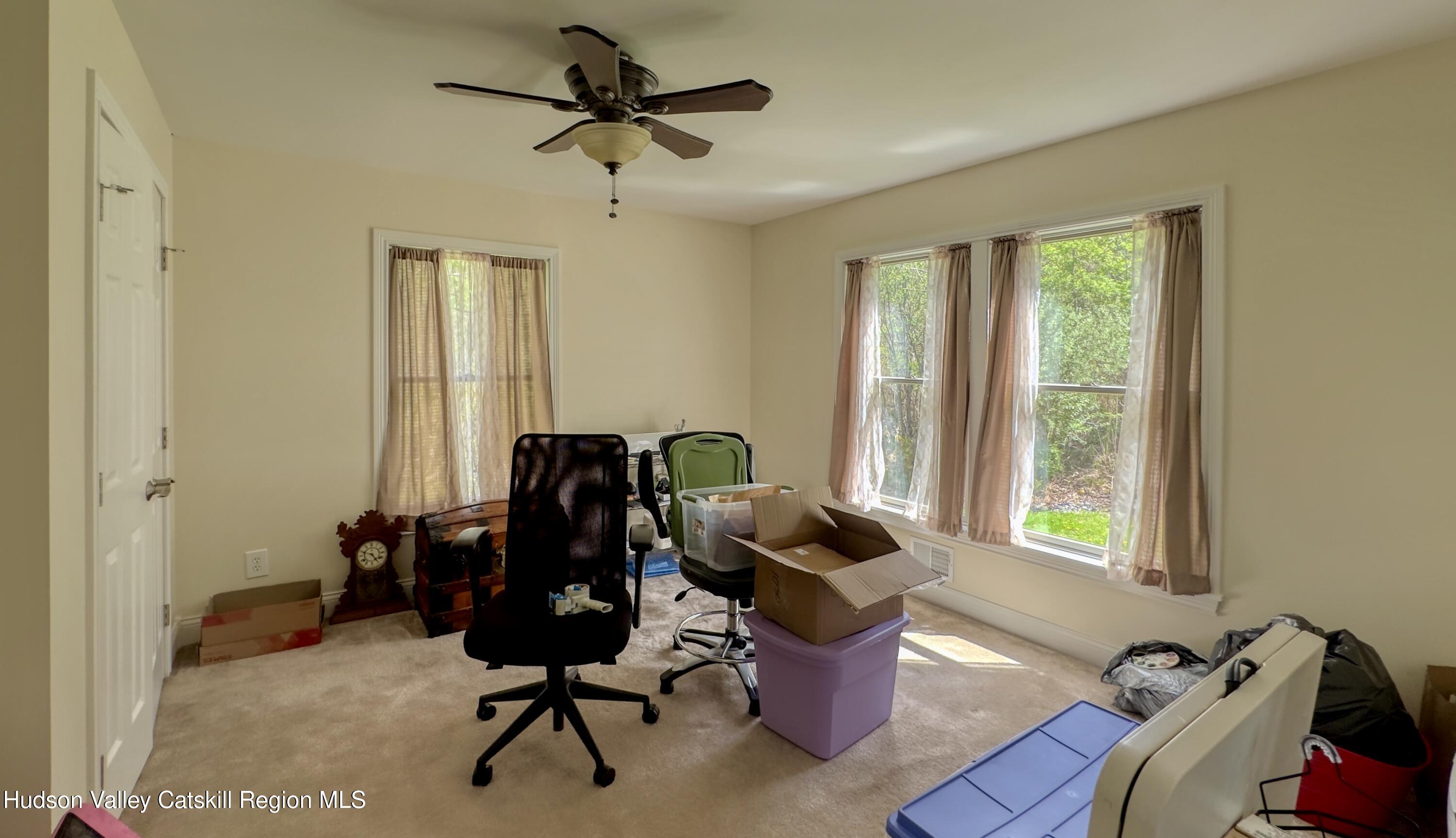 996 Sleepy Hollow Road Athens, NY 12015 - Photo 10 of 32 a view of a workspace with furniture and a window