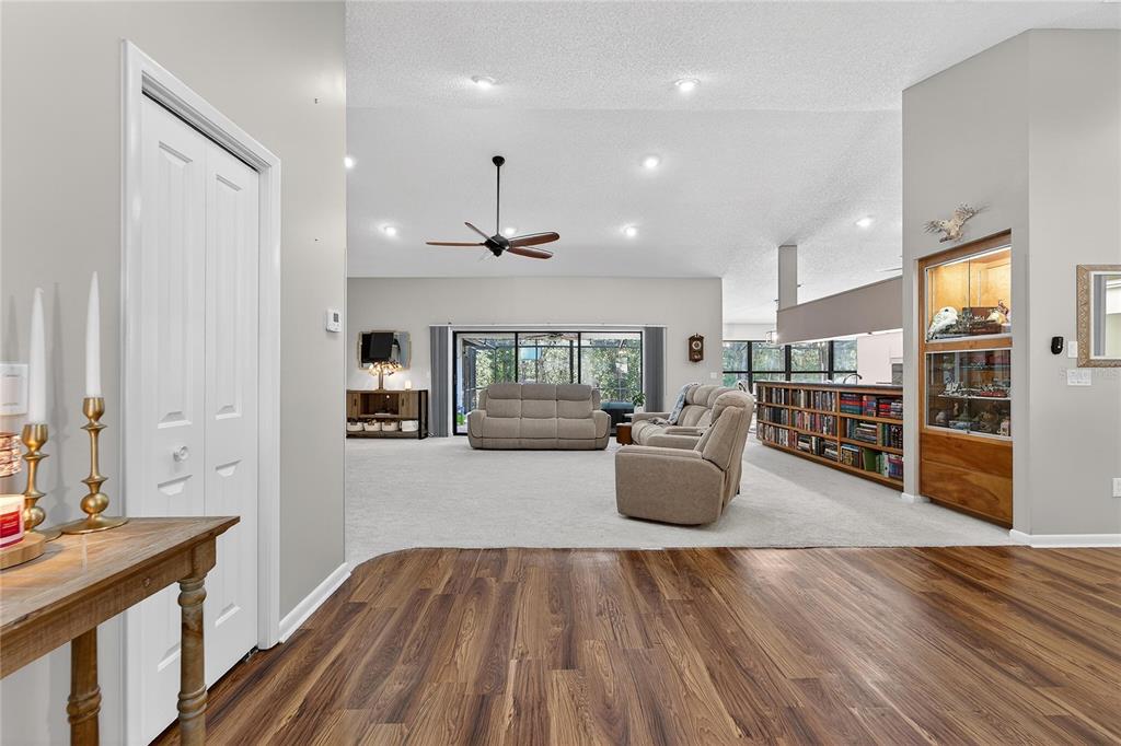 23 Chinkapin Circle Homosassa, FL 34446 - Photo 11 of 69 a living room with furniture and wooden floor