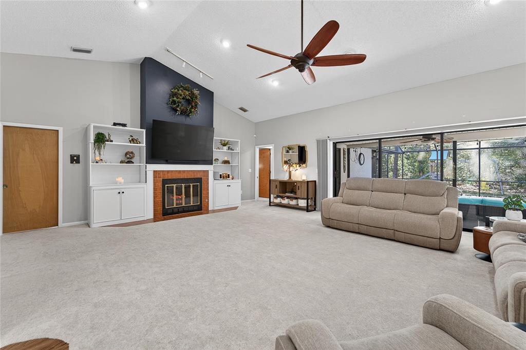 23 Chinkapin Circle Homosassa, FL 34446 - Photo 13 of 69 a living room with furniture and a flat screen tv