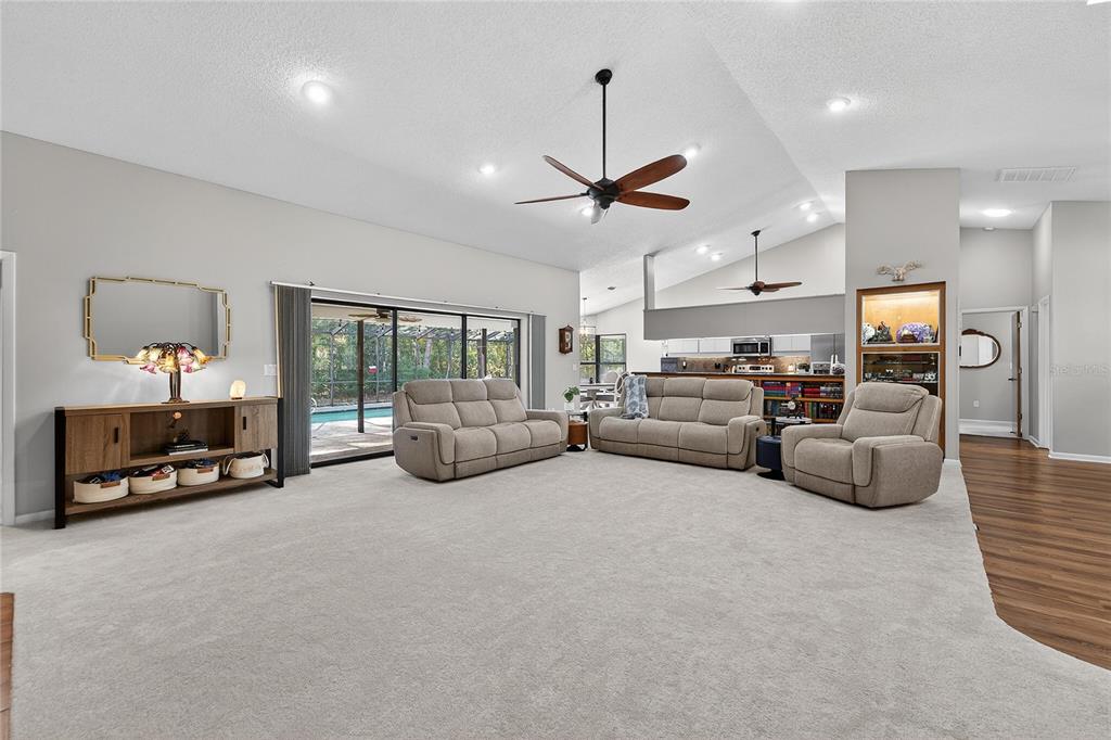23 Chinkapin Circle Homosassa, FL 34446 - Photo 15 of 69 a living room with furniture and a flat screen tv