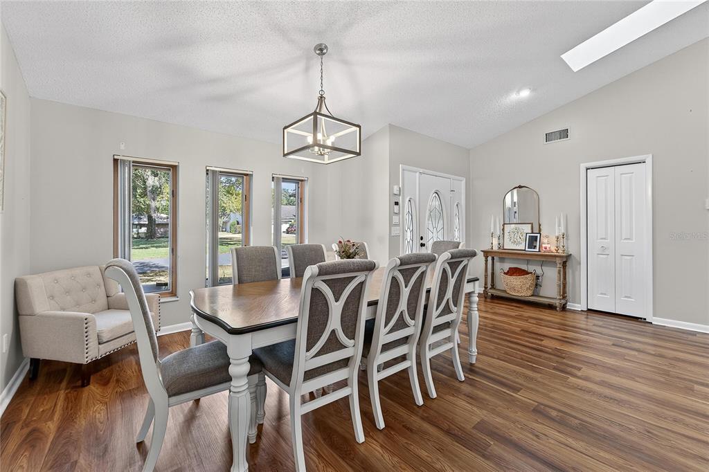 23 Chinkapin Circle Homosassa, FL 34446 - Photo 19 of 69 a view of a dining room with furniture window and wooden floor