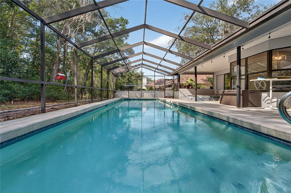 23 Chinkapin Circle Homosassa, FL 34446 - Photo 2 of 69 a view of a swimming pool with a patio