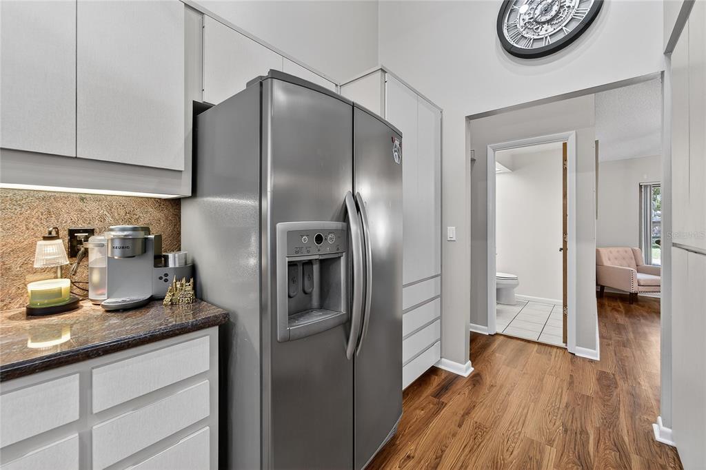 23 Chinkapin Circle Homosassa, FL 34446 - Photo 25 of 69 a kitchen with granite countertop stainless steel appliances a refrigerator a sink and cabinets