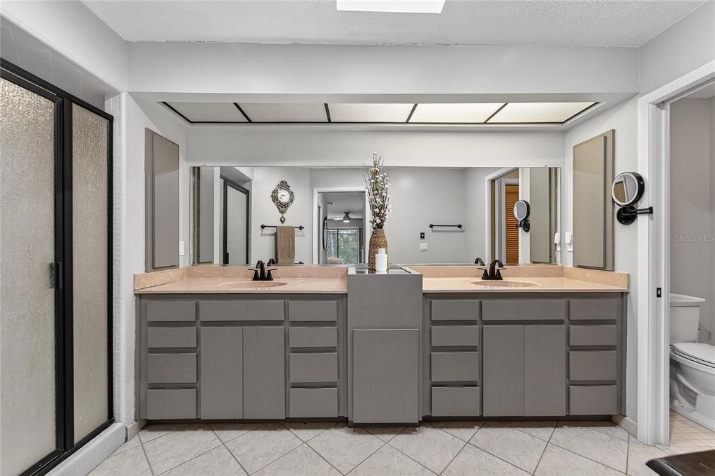 23 Chinkapin Circle Homosassa, FL 34446 - Photo 35 of 69 a bathroom with a granite countertop sink mirror and