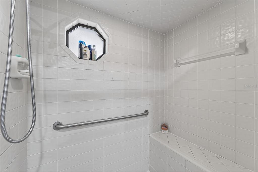 23 Chinkapin Circle Homosassa, FL 34446 - Photo 38 of 69 a bathroom with a bathtub and a shower
