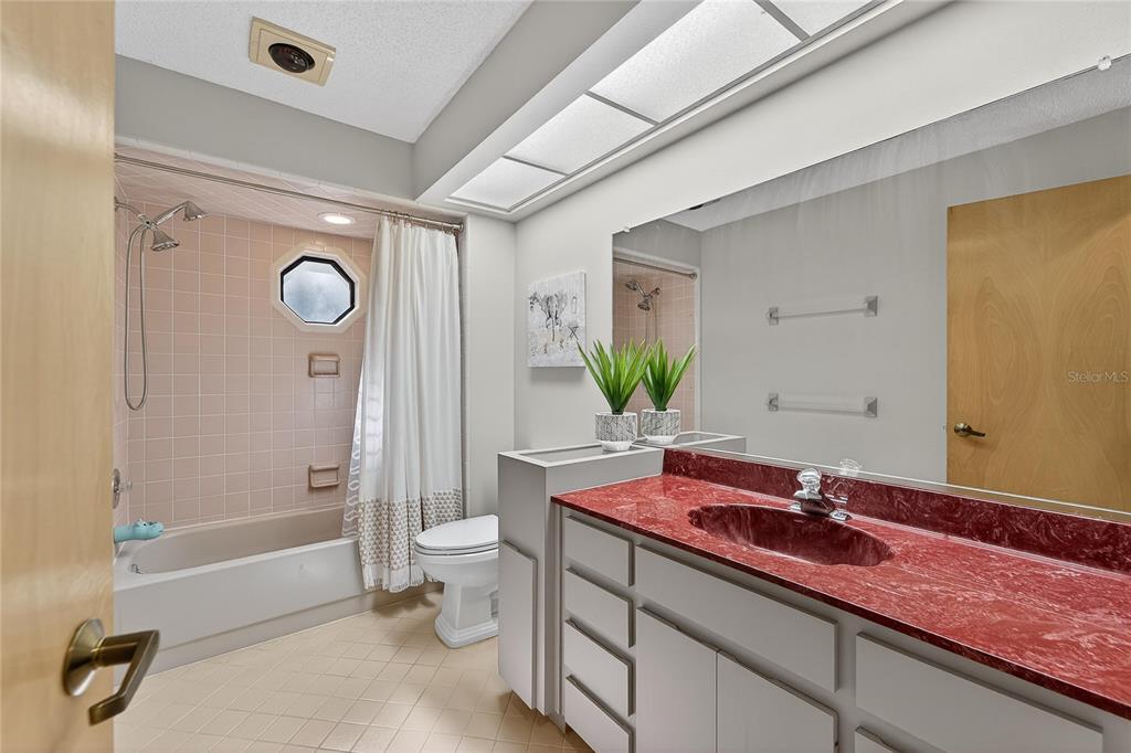23 Chinkapin Circle Homosassa, FL 34446 - Photo 40 of 69 a bathroom with a granite countertop sink a toilet and shower