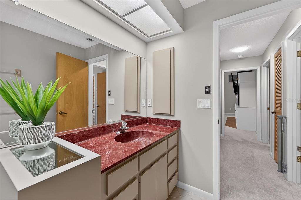 23 Chinkapin Circle Homosassa, FL 34446 - Photo 42 of 69 a bathroom with a sink and a mirror