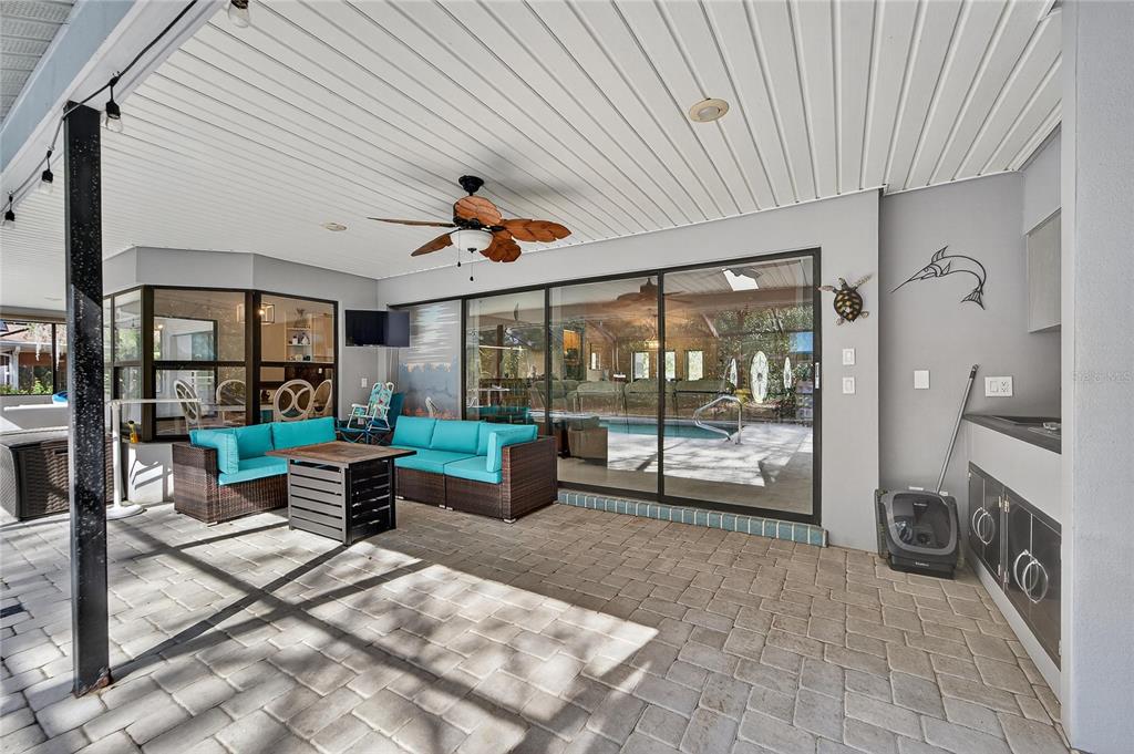 23 Chinkapin Circle Homosassa, FL 34446 - Photo 50 of 69 a living room with patio furniture and a floor to ceiling window