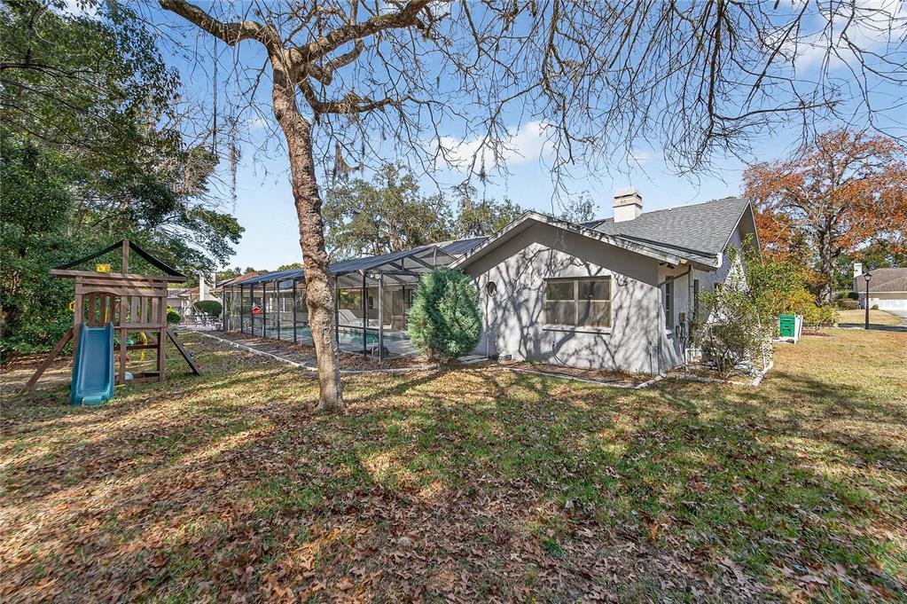 23 Chinkapin Circle Homosassa, FL 34446 - Photo 60 of 69 a view of a house with a yard