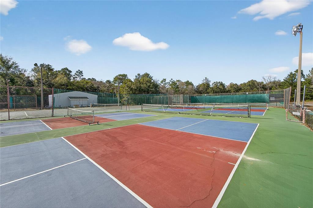 23 Chinkapin Circle Homosassa, FL 34446 - Photo 66 of 69 a view of an outdoor space and tennis court