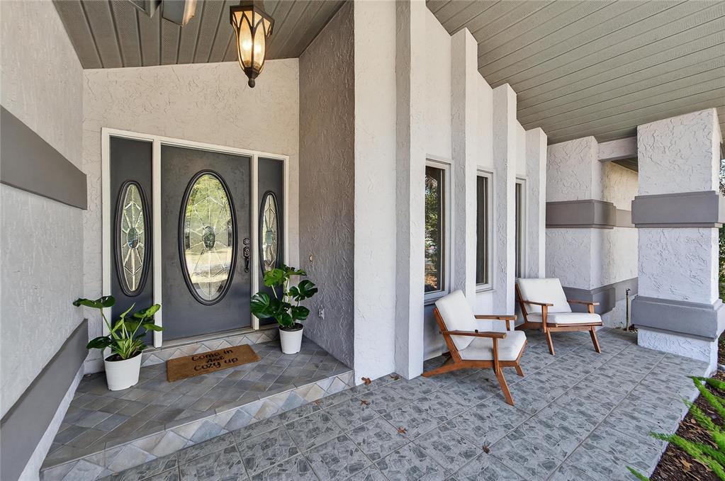 23 Chinkapin Circle Homosassa, FL 34446 - Photo 10 of 69 a living room with furniture and a potted plant