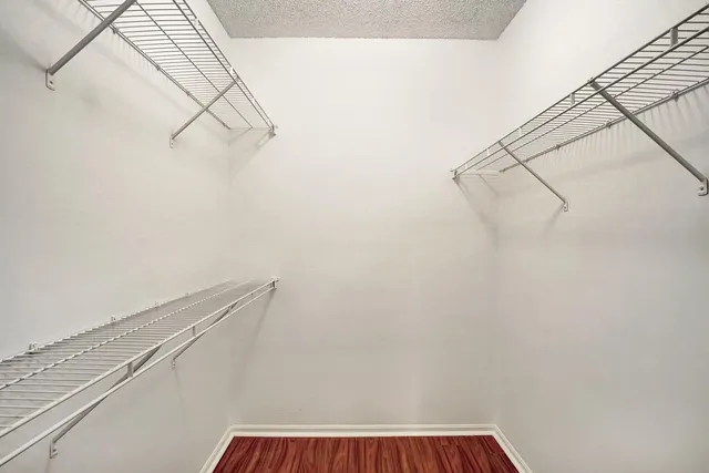 a view of a room with racks on the wall