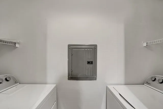 a view of a hallway with a furniture