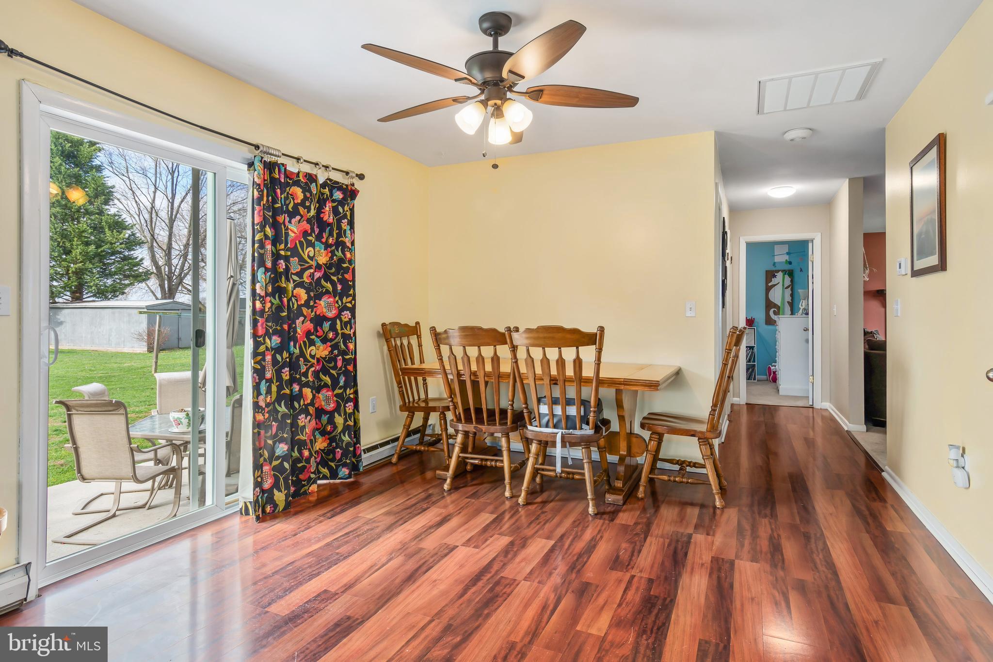 10448 Worton Road Worton, MD 21678 - Photo 7 of 18 Sliding glass door out to patio and back yard.