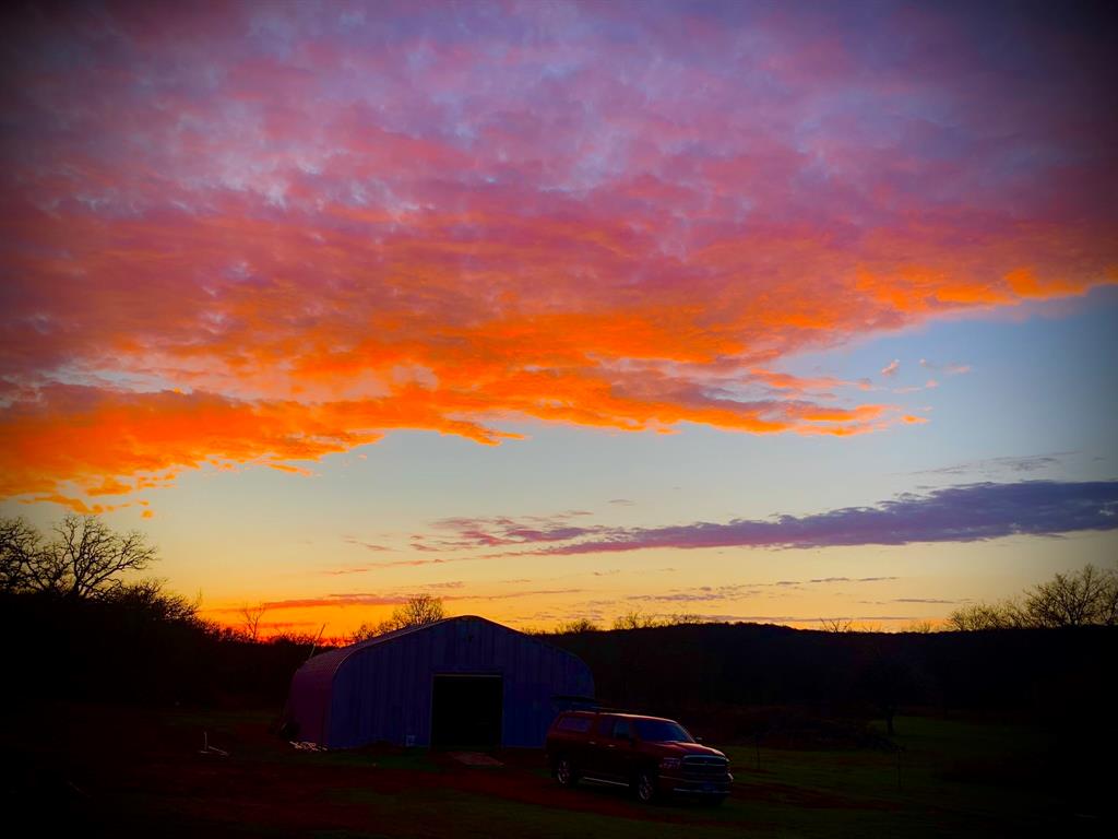 8381 Salt Creek Road Jacksboro, TX 76458 - Photo 1 of 37 a view of an ocean and a mountain