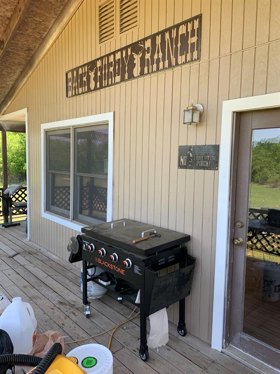 8381 Salt Creek Road Jacksboro, TX 76458 - Photo 8 of 37 a building outdoor space with patio furniture