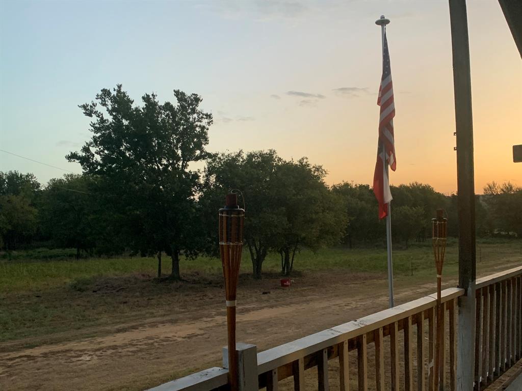 8381 Salt Creek Road Jacksboro, TX 76458 - Photo 10 of 37 a view of a wooden bridge