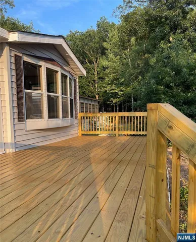 a view of a house with wooden floor