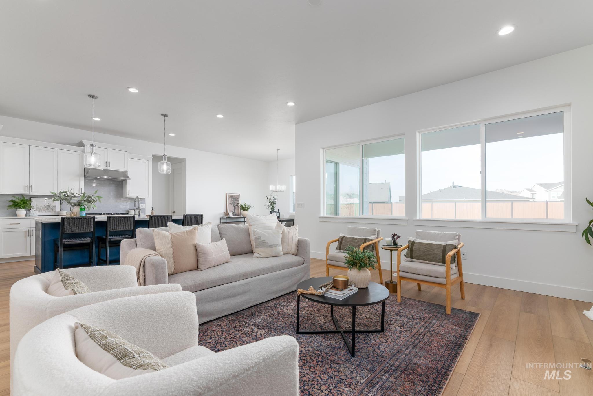 3612 North Pindall Way Star, ID 83669 - Photo 3 of 12 Living room with light wood-style flooring and recessed lighting