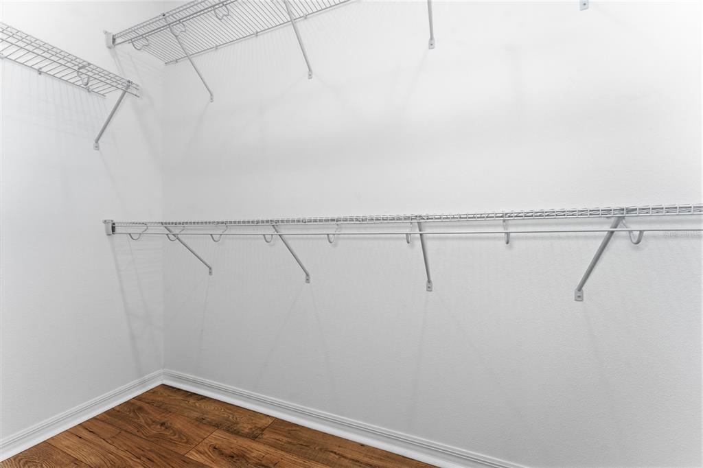 2834 High Pointe Circle Clermont, FL 34711 - Photo 17 of 39 a view of a room with racks on the wall