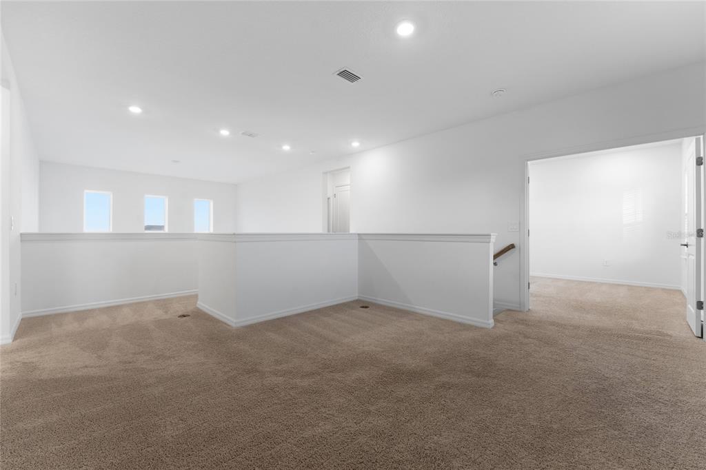 2834 High Pointe Circle Clermont, FL 34711 - Photo 18 of 39 a view of an empty room
