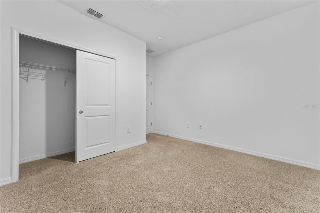 2834 High Pointe Circle Clermont, FL 34711 - Photo 23 of 39 a view of an empty room