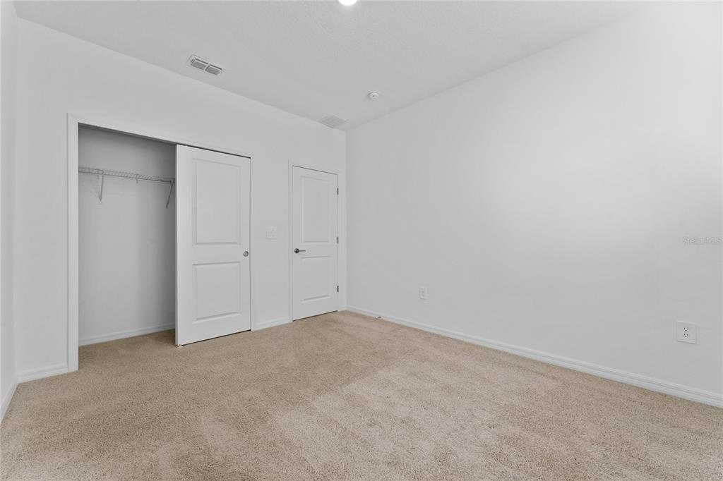 2834 High Pointe Circle Clermont, FL 34711 - Photo 25 of 39 a view of an empty room