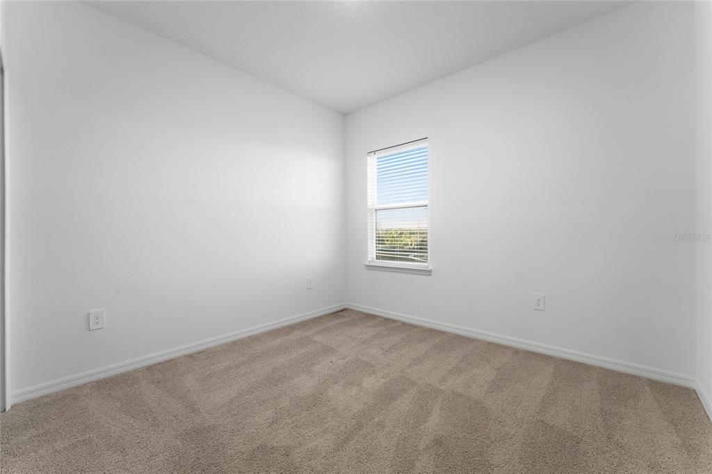 2834 High Pointe Circle Clermont, FL 34711 - Photo 26 of 39 an empty room with a window