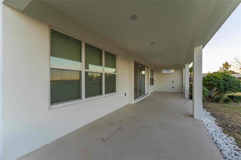 2834 High Pointe Circle Clermont, FL 34711 - Photo 29 of 39 a view of a big room with closet and yard
