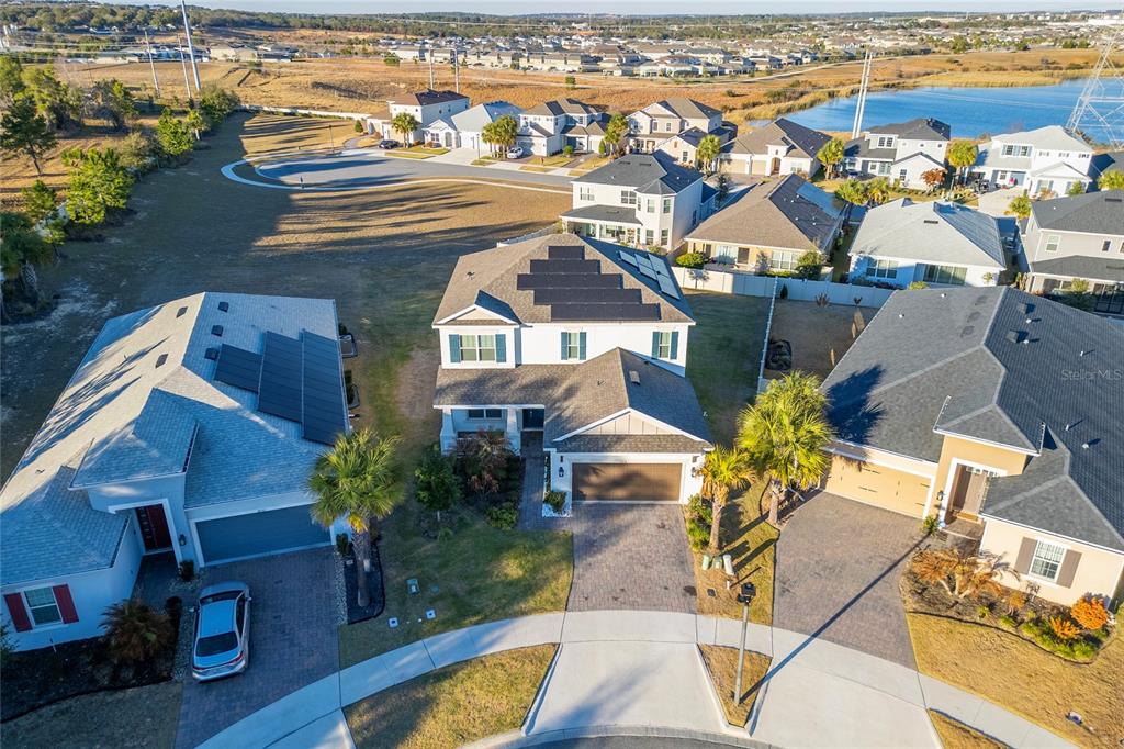 2834 High Pointe Circle Clermont, FL 34711 - Photo 30 of 39 an aerial view of residential houses with outdoor space