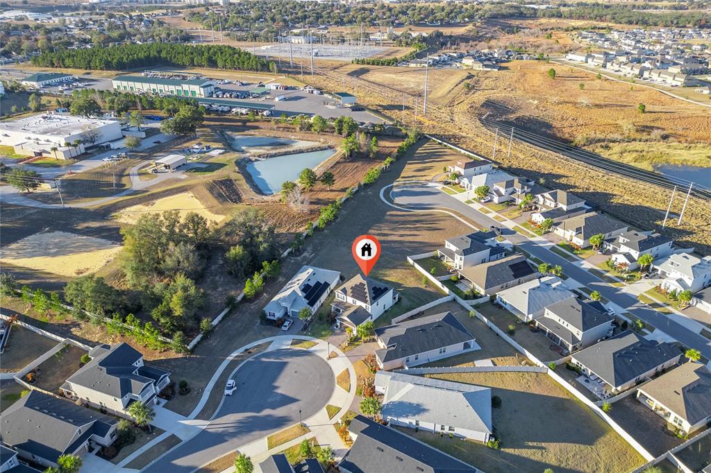 2834 High Pointe Circle Clermont, FL 34711 - Photo 32 of 39 an aerial view of a house with a lake view