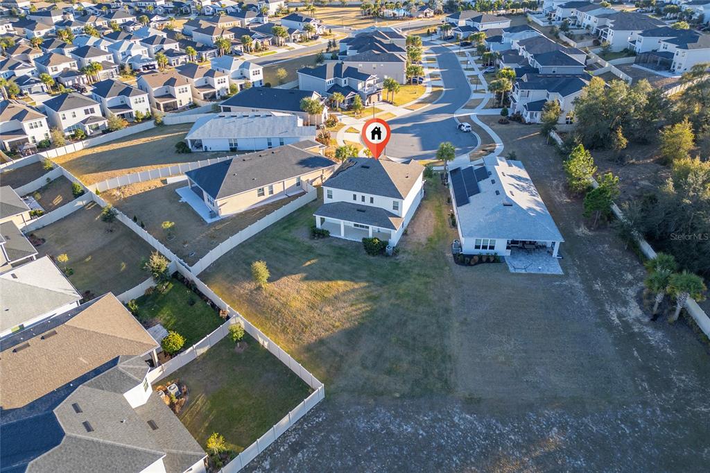 2834 High Pointe Circle Clermont, FL 34711 - Photo 35 of 39 an aerial view of residential houses with outdoor space