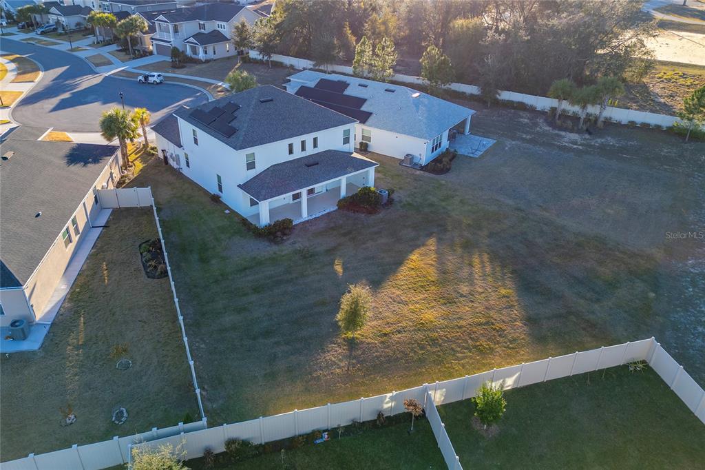 2834 High Pointe Circle Clermont, FL 34711 - Photo 36 of 39 a view of a house with a yard