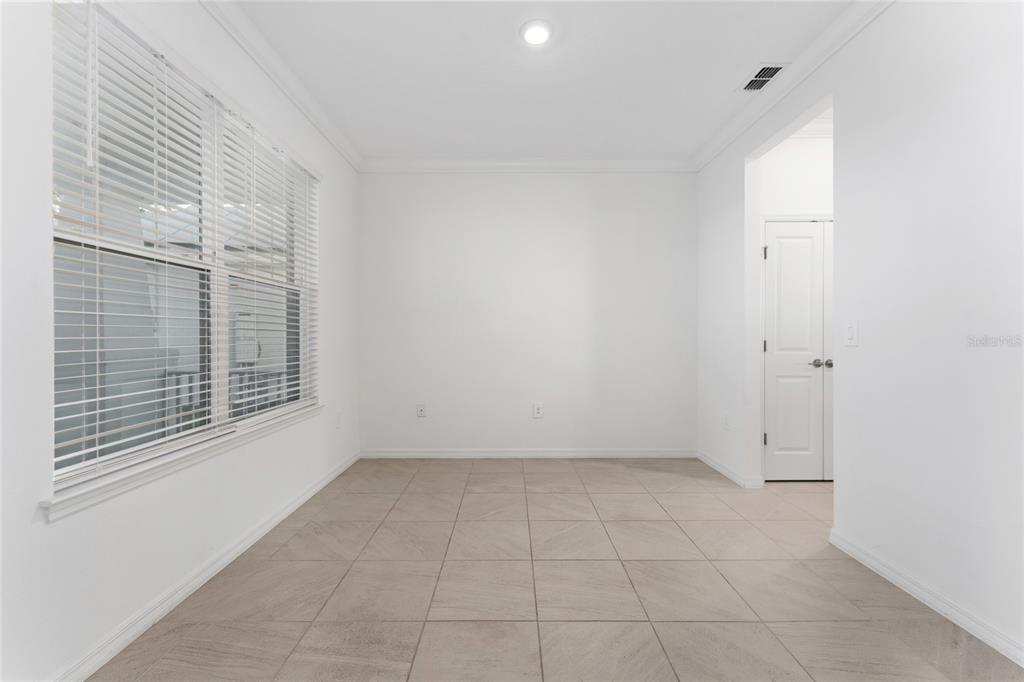 2834 High Pointe Circle Clermont, FL 34711 - Photo 9 of 39 a view of an empty room with a window