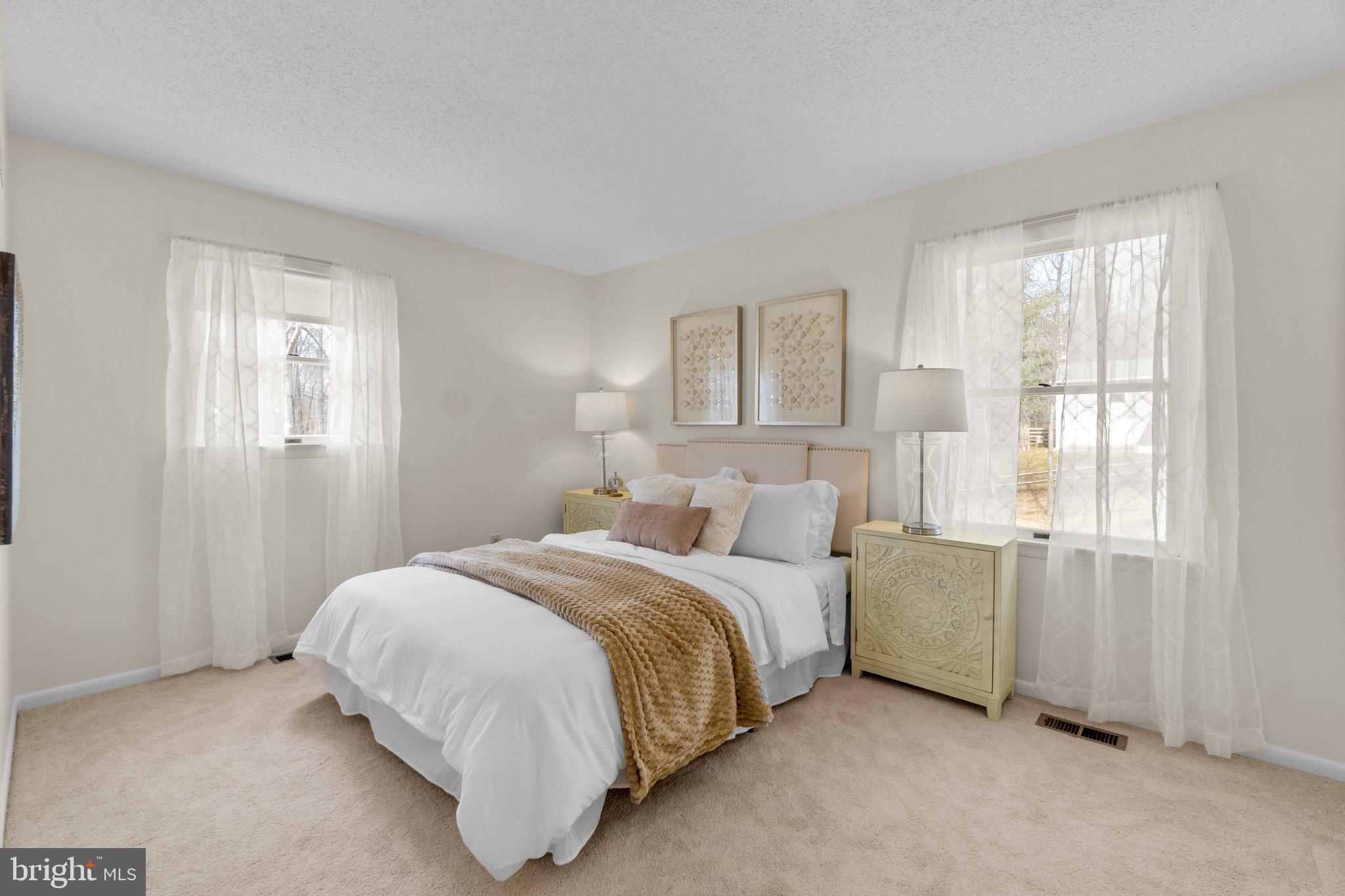 3692 Altondale Road Reisterstown, MD 21136 - Photo 8 of 30 a bedroom with a bed and a window