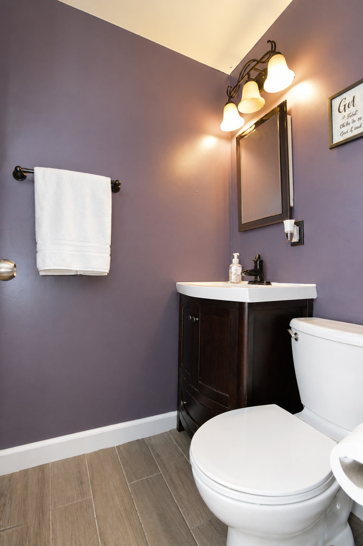 3206 Hunter Path McHenry, IL 60050 - Photo 12 of 13 a bathroom with a sink mirror vanity and toilet