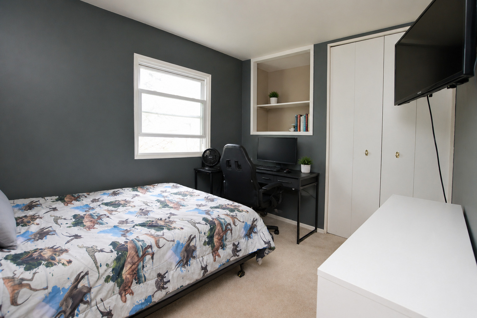 3206 Hunter Path McHenry, IL 60050 - Photo 10 of 13 a bedroom with a bed and a flat screen tv