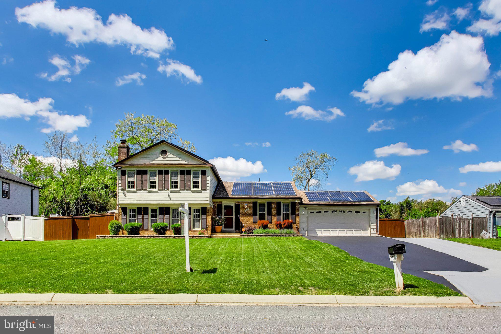 14216 Alderton Road Silver Spring, MD 20906 - Photo 5 of 63 a view of a house with a yard