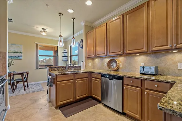 a bedroom with furniture and a flat screen tv