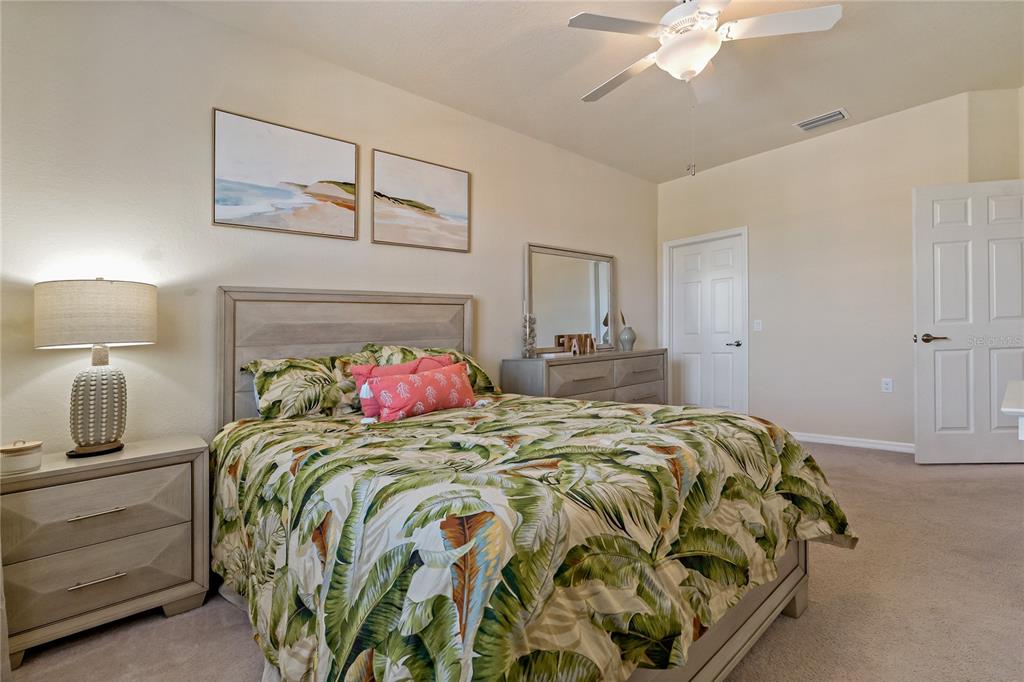 7015 Grand Estuary Trail, Unit 103 Bradenton, FL 34212 - Photo 19 of 62 a bedroom with a bed and window