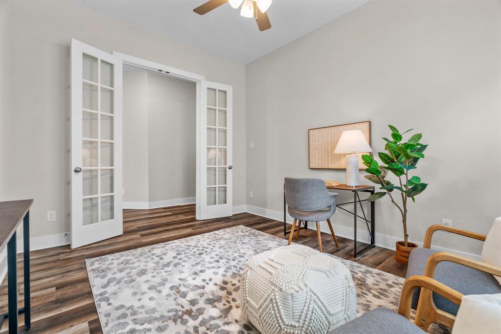 1821 Stonewall Road Argyle, TX 76226 - Photo 29 of 40 Room featuring French doors with glass panes, wood-finish flooring, a ceiling fan, and light-colored walls with white baseboards